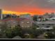 Scenic sunset from balcony overlooking waterfront community and lush landscaping at 400 Island Way # 502, Clearwater Beach, FL 33767