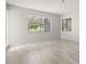 Spacious room with views of the backyard through its large window at 440 Lakeview Dr # 34, Palm Harbor, FL 34683
