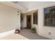 Welcoming front entryway with a stylish door, decorative plants, and neutral color scheme at 440 Lakeview Dr # 34, Palm Harbor, FL 34683