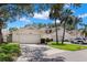 Charming single-story home featuring a well-maintained lawn, driveway, and attached garage at 440 Lakeview Dr # 34, Palm Harbor, FL 34683