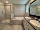 Bathroom with shower, soaking tub, double sinks, and tiled floors at 4448 Globe Thistle, Tampa, FL 33619