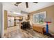 Vintage kitchen featuring wood cabinets, tile countertops, and modern appliances at 4612 E Seneca Ave, Tampa, FL 33617