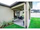 Covered backyard patio with string lights and a view of the lawn at 5003 Wabash Pl, Riverview, FL 33578