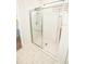Clean and bright bathroom showcasing a large glass-enclosed shower at 5003 Wabash Pl, Riverview, FL 33578