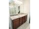 Bathroom features double sinks, granite countertops, and tiled floors at 5003 Wabash Pl, Riverview, FL 33578