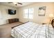 Spacious bedroom features neutral carpet, a ceiling fan, and lots of natural light at 5003 Wabash Pl, Riverview, FL 33578
