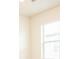 Neutral bedroom with a large window, showing natural light and a ceiling fan at 5003 Wabash Pl, Riverview, FL 33578