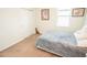 Cozy bedroom with carpet, neutral walls, and a plush gray bed covering at 5003 Wabash Pl, Riverview, FL 33578