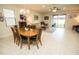 Open concept dining area between the living room and the kitchen at 5003 Wabash Pl, Riverview, FL 33578