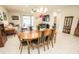 Open concept dining area between the living room and the kitchen at 5003 Wabash Pl, Riverview, FL 33578