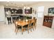 Open concept dining area between the kitchen and the living room at 5003 Wabash Pl, Riverview, FL 33578