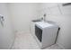 Functional laundry room area with modern washer and dryer at 5003 Wabash Pl, Riverview, FL 33578