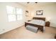 Bedroom featuring a window, stylish decor, and coordinated furnishings at 5003 Wabash Pl, Riverview, FL 33578