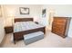 Bedroom with a view of the en suite bathroom, decor and coordinated furnishings at 5003 Wabash Pl, Riverview, FL 33578