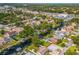 Scenic aerial view of a waterfront neighborhood with beautiful canals and lush greenery at 51 Cypress Dr, Palm Harbor, FL 34684