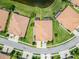 Beautiful aerial view of single Gathering home with screened-in patio that backs up to a pond at 5422 Sunset Falls Dr, Apollo Beach, FL 33572