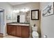 Spacious bathroom with double sinks, granite countertops, and a glass shower at 5422 Sunset Falls Dr, Apollo Beach, FL 33572