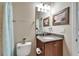 Bathroom with granite vanity, framed art, and a tub with shower at 5422 Sunset Falls Dr, Apollo Beach, FL 33572