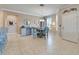 Bright dining area features tile flooring, a charming table set, and a convenient beverage center with mini fridge at 5422 Sunset Falls Dr, Apollo Beach, FL 33572