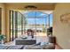 Beautiful screened lanai featuring outdoor seating and serene lake views at 5422 Sunset Falls Dr, Apollo Beach, FL 33572