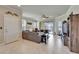Open-concept living area with lanai access and stylish decor at 5422 Sunset Falls Dr, Apollo Beach, FL 33572