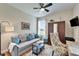 Inviting office area with a comfortable sofabed, chair, and ample storage at 5422 Sunset Falls Dr, Apollo Beach, FL 33572