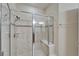 Updated glass shower with bench and tile detailing at 5422 Sunset Falls Dr, Apollo Beach, FL 33572