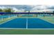 Well maintained tennis courts with new looking nets at the community center at 5422 Sunset Falls Dr, Apollo Beach, FL 33572