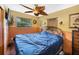 Cozy bedroom featuring warm tones, natural light from the windows, and comfortable sleeping arrangements at 5643 86Th N Ave, Pinellas Park, FL 33782