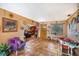 Inviting living room with terracotta flooring, eclectic decor, and comfortable seating for relaxing and entertaining at 5643 86Th N Ave, Pinellas Park, FL 33782