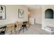 A quiet carpeted study area with built in desk and drawers at 583 Mangrove Shade Cir, Apollo Beach, FL 33572