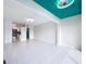 Bright, open-concept space allows for easy transition between living area and fully-equipped kitchen at 599 Westwinds Dr # 9, Palm Harbor, FL 34683