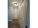 Hallway with closet space and hardwood floors at 6008 Firefly Ln, Apollo Beach, FL 33572