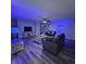 Modern living room with a sofa set, stylish floors, and recessed lighting for a sleek ambiance at 6008 Firefly Ln, Apollo Beach, FL 33572