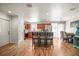 Modern kitchen featuring cherry cabinets, stainless steel appliances, an island, and barstool seating at 630 Mac Crillus Rd, Largo, FL 33770
