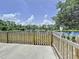 Gated access to a tranquil lake surrounded by lush green trees at 6314 Gondola Dr, Riverview, FL 33578