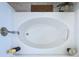 Clean, white bathtub offers a simple, uncluttered bathing space at 6314 Gondola Dr, Riverview, FL 33578