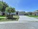 Attractive single-story home with a wide driveway, attached garage, and established landscaping at 6314 Gondola Dr, Riverview, FL 33578