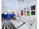 Cozy living room featuring modern art, striped chairs and white sectional sofa at 6314 Gondola Dr, Riverview, FL 33578