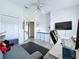 Multi-functional room with a desk, sofa, and television, perfect for work and relaxation at 6314 Gondola Dr, Riverview, FL 33578