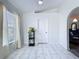 Bright room with marble tile flooring, ample natural light, and a neutral color palette at 6314 Gondola Dr, Riverview, FL 33578