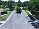 Scenic neighborhood street with lush landscaping and a welcoming entrance at 6314 Gondola Dr, Riverview, FL 33578