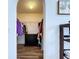 Spacious walk-in closet has organized storage and a black dresser at 6314 Gondola Dr, Riverview, FL 33578