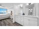 En-suite bathroom features a double sink vanity with ocean view, perfect for relaxed mornings at 6372 Palma Del Mar S Blvd # 601, St Petersburg, FL 33715
