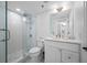 Modern bathroom with a glass-enclosed shower, stylish vanity, and a beautifully tiled floor at 6372 Palma Del Mar S Blvd # 601, St Petersburg, FL 33715