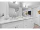 Elegant bathroom features a double sink vanity with marble counters, perfect for refined living at 6372 Palma Del Mar S Blvd # 601, St Petersburg, FL 33715