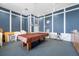 Blue-walled game room features a pool table, clock, and storage, ideal for community entertainment at 6372 Palma Del Mar S Blvd # 601, St Petersburg, FL 33715
