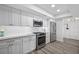 Bright kitchen with stainless steel appliances and granite countertops at 6372 Palma Del Mar S Blvd # 601, St Petersburg, FL 33715