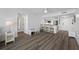 This bright living space has wood floors, great natural light and an open floor plan to the kitchen at 6372 Palma Del Mar S Blvd # 601, St Petersburg, FL 33715