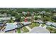 Aerial view of home in a well-maintained neighborhood showcasing mature landscaping and convenient access to amenities at 6921 8Th Street E Ct, Sarasota, FL 34243